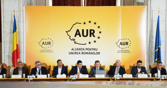 partidul-aur Ce au de ascuns liderii ”suveraniști”? Un nou conflict explodează în curtea AUR, după recentele scandaluri cu strângerea de ”garanții” financiare în conturi bancare de către liderul partidului, George Simion, și reținerea liderului lor moral, Călin Georgescu, pentru infracțiuni de înșelătorie